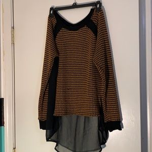 Never worn sweater with sheer back.